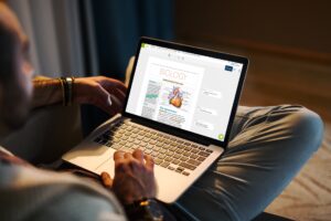 man using revisely on laptop